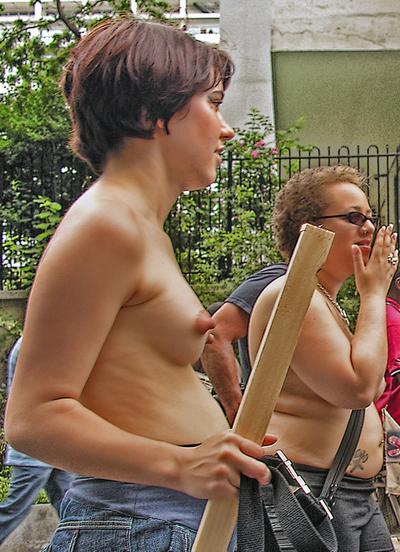 pretty naked protester with pert breasts