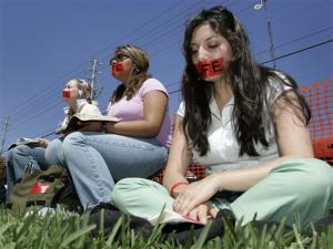 gagged women at sit-in