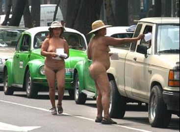 nude women distributing leaflets in traffic