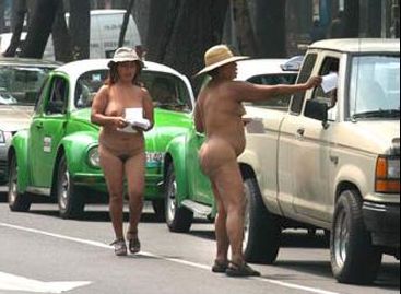 nude women distributing leaflets in traffic