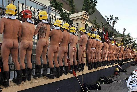 one hundred naked firemen protesting for better wages