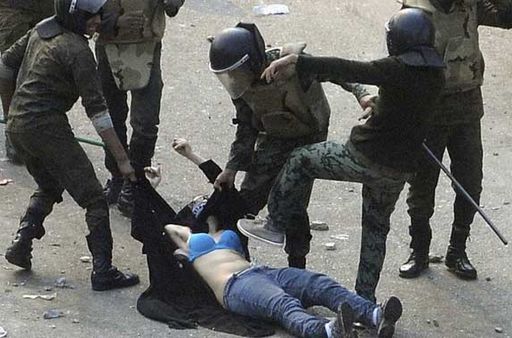 woman in egypt stripped by police and beaten during her arrest at a protest