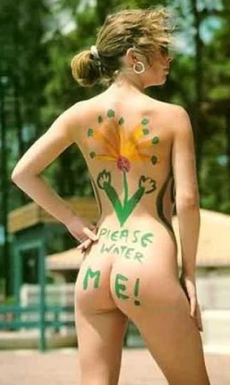 nude woman with plant-watering body art